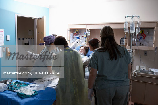 Pregnant Women Giving Birth In Hospital